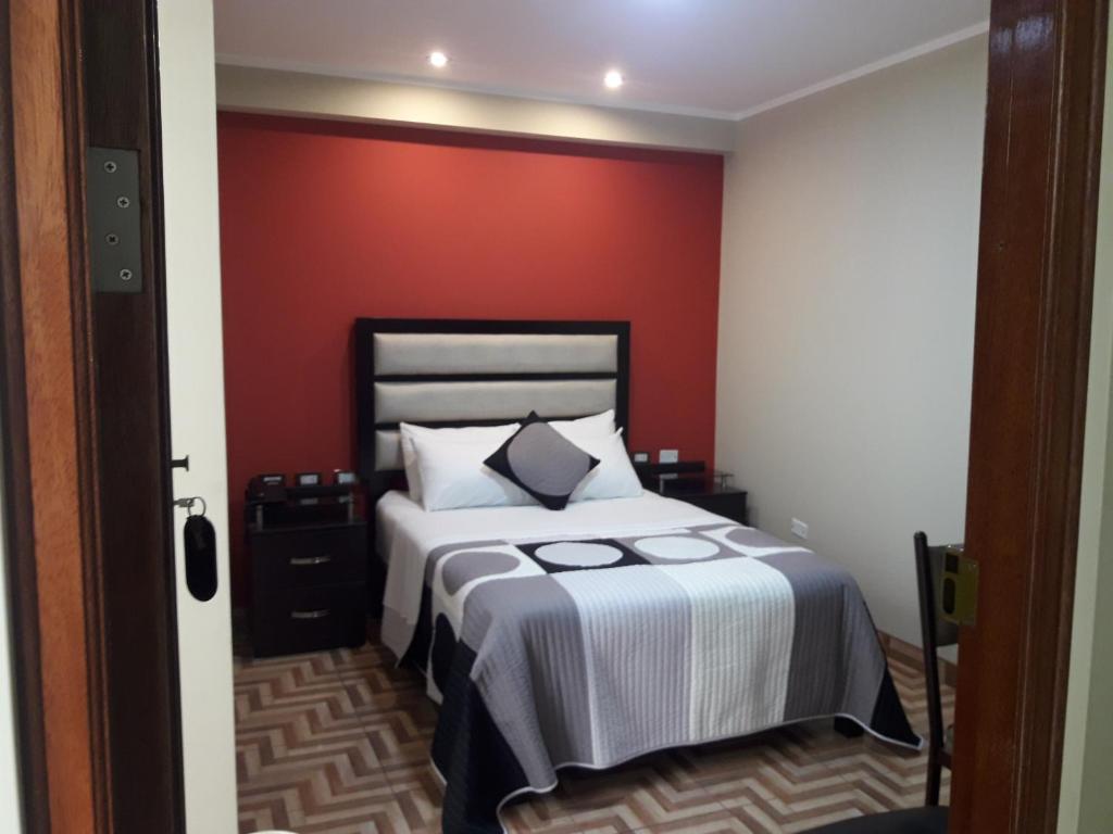 Postel nebo postele na pokoji v ubytování Gavina Inn Hotel
