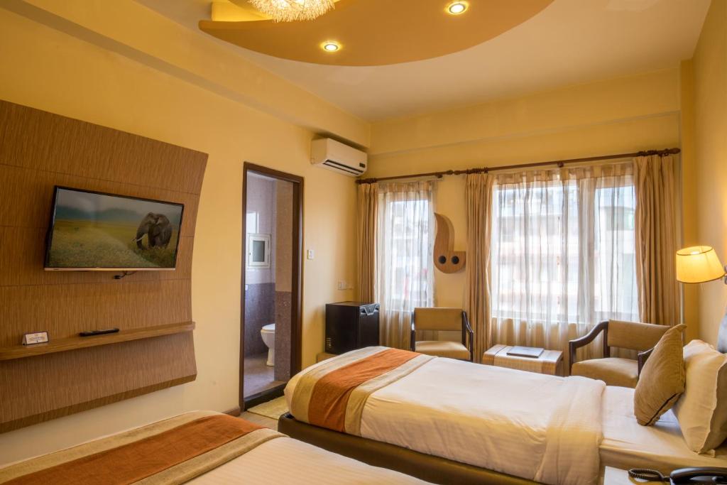 TV a/nebo společenská místnost v ubytování Hotel Moonlight