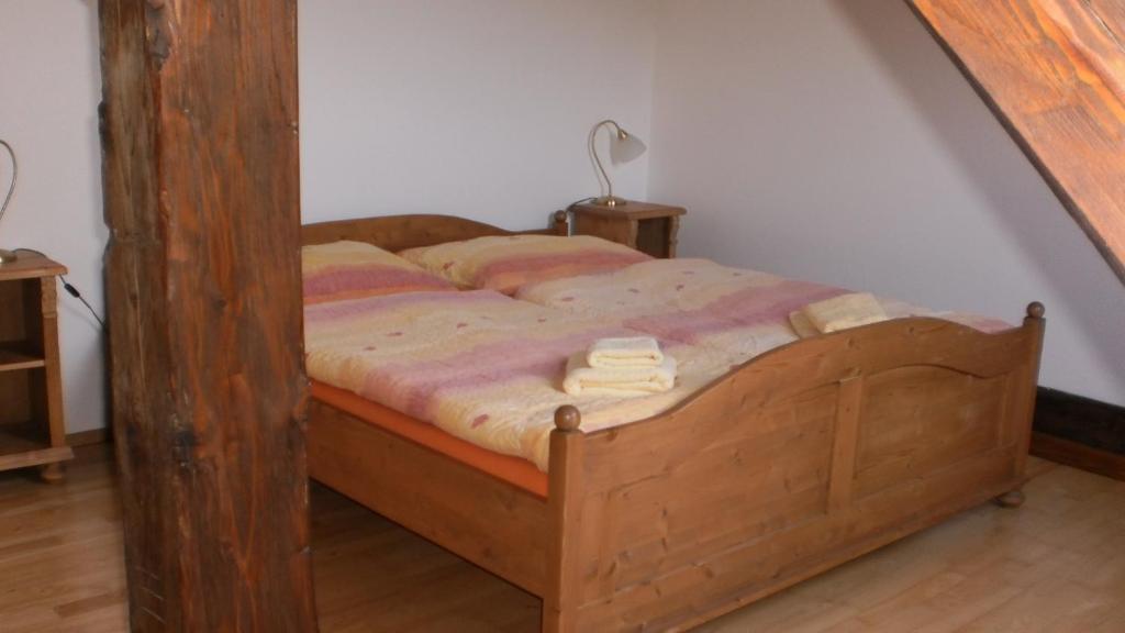 Postel nebo postele na pokoji v ubytování Statek Sedlečko
