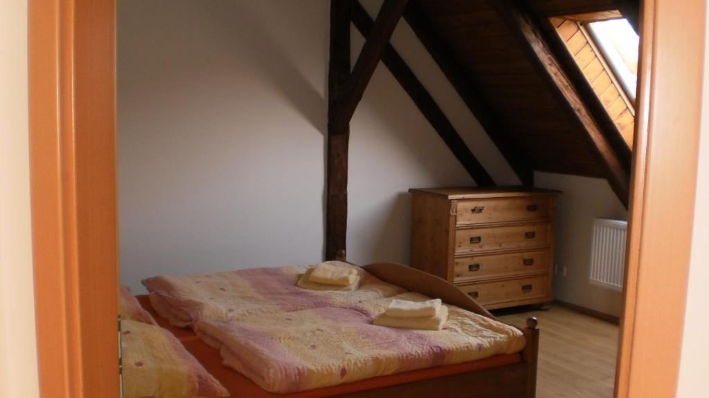 Postel nebo postele na pokoji v ubytování Statek Sedlečko