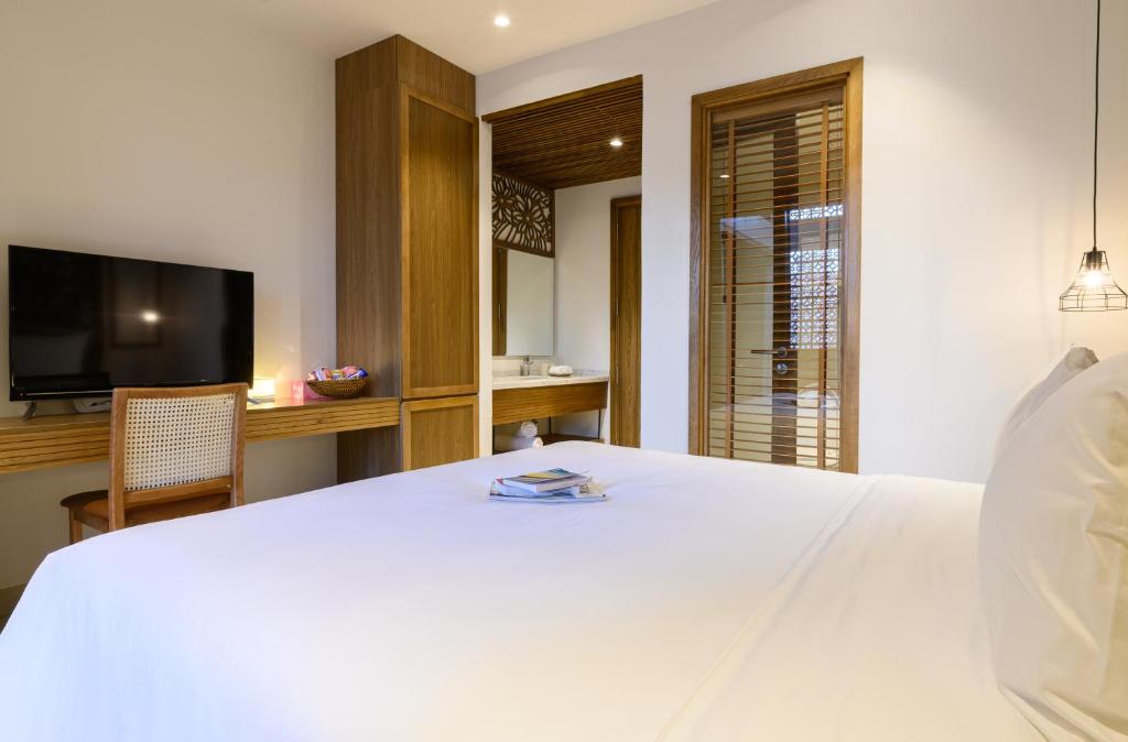 Phòng Deluxe Giường Đôi Có Ban Công Và Tầm Nhìn Ra Vườn
