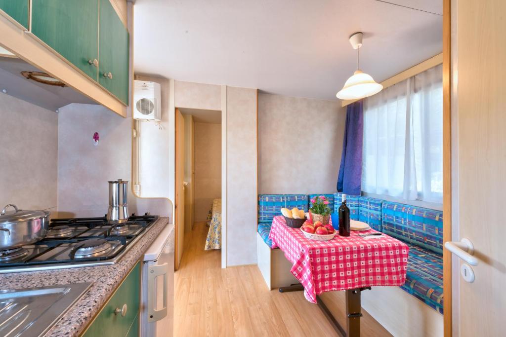 Kuchyň nebo kuchyňský kout v ubytování Camping Village Mareblu