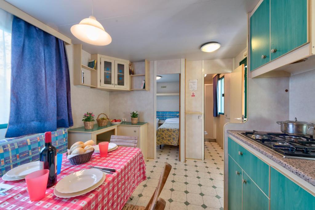 Kuchyň nebo kuchyňský kout v ubytování Camping Village Mareblu