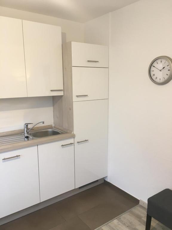 Kuchyň nebo kuchyňský kout v ubytování Haus Pirola Bensersiel