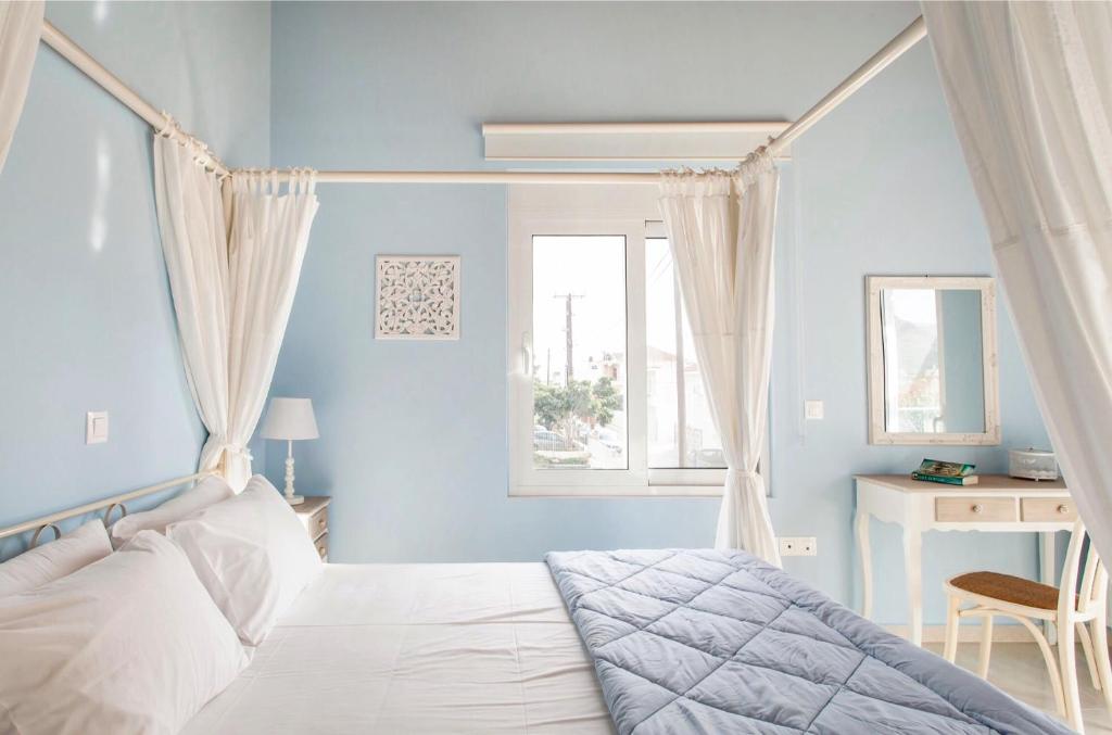 A bed or beds in a room at Villa Despina in Kisamos