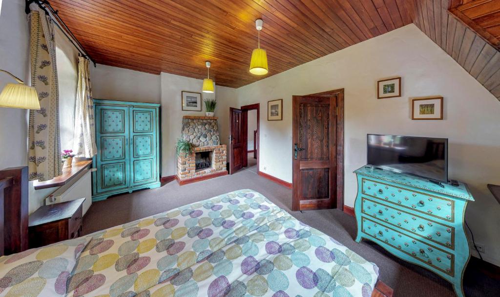 Posteľ alebo postele v izbe v ubytovaní Osada Ulnowo - Holliday & Party House