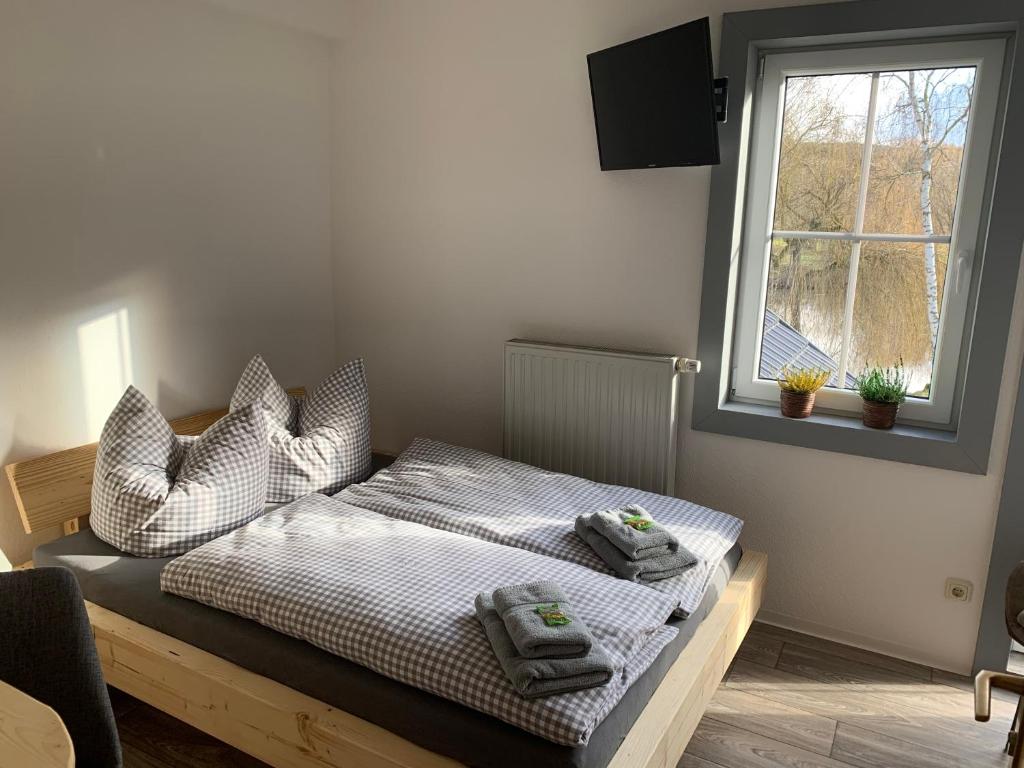 Postel nebo postele na pokoji v ubytování Landgasthof Wetteraperle