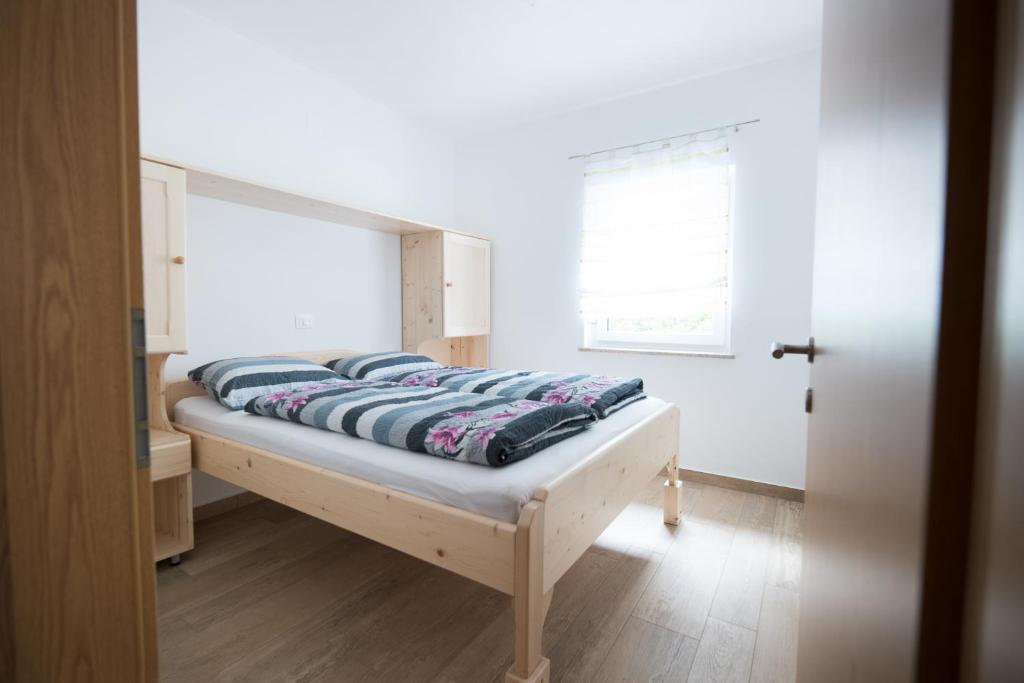 Postel nebo postele na pokoji v ubytování House DorMica