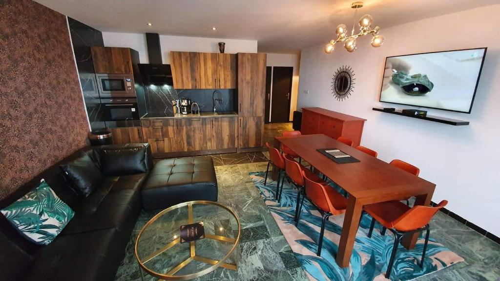 Kuchyň nebo kuchyňský kout v ubytování CENTRE 10mn Pied pistes et JANDRI 3S VUE MUZELLE 8 pers Wifi