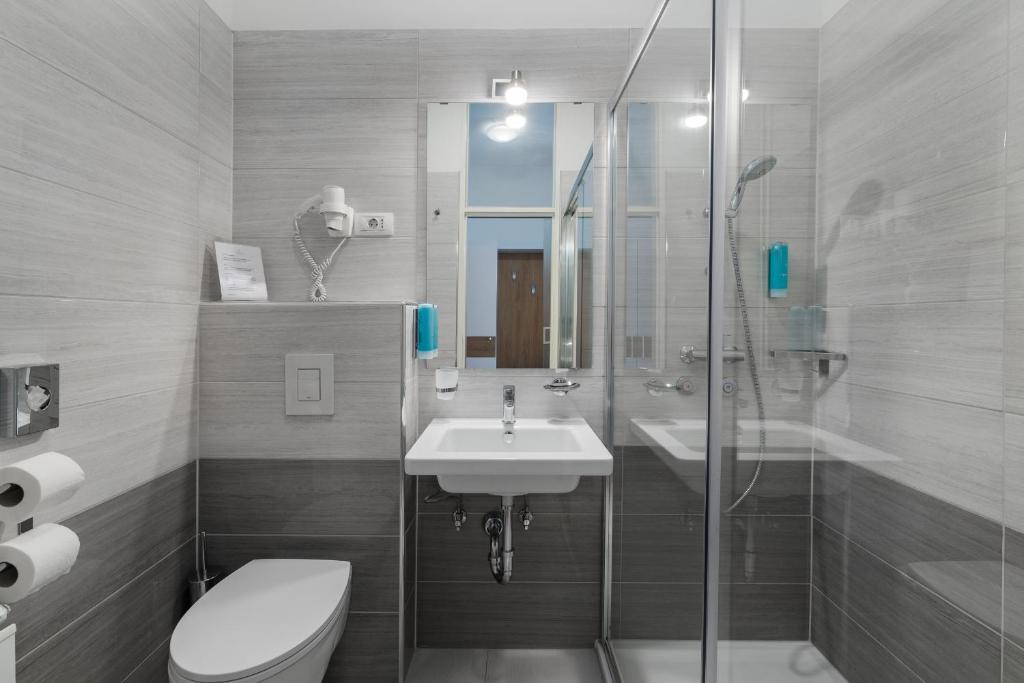 Koupelna v ubytování Hotel Dvorec