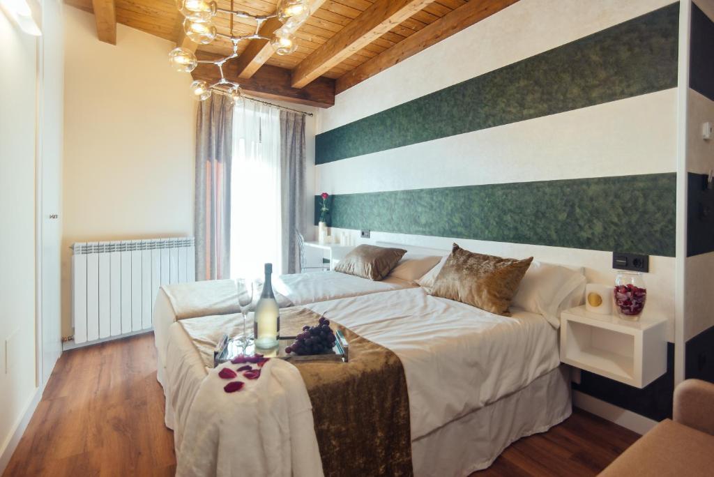 Katil atau katil-katil dalam bilik di HOTEL RURAL PINARES DE SORIA (Alquiler íntegro)
