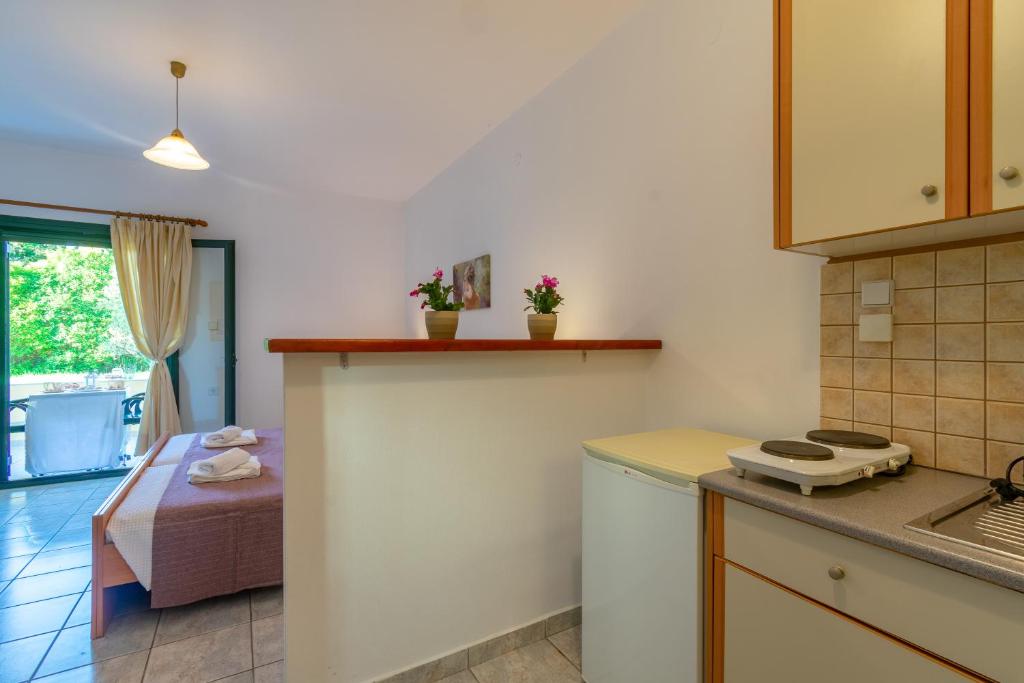 A kitchen or kitchenette at Rivendell Apartments
