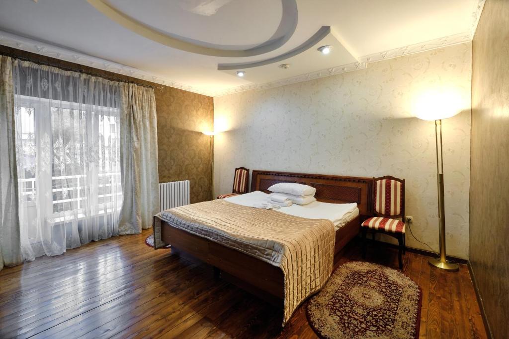 Postel nebo postele na pokoji v ubytování VICTOR Hotel Resort & SPA