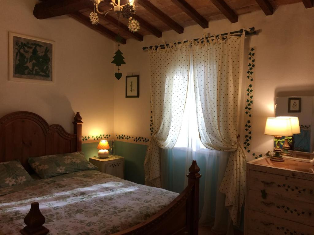 Postel nebo postele na pokoji v ubytování Casale Eredità