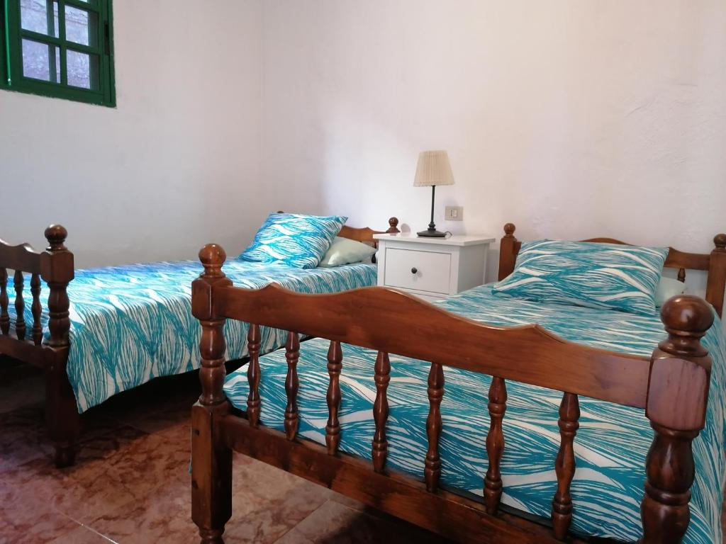 A bed or beds in a room at Casa Vista Bella