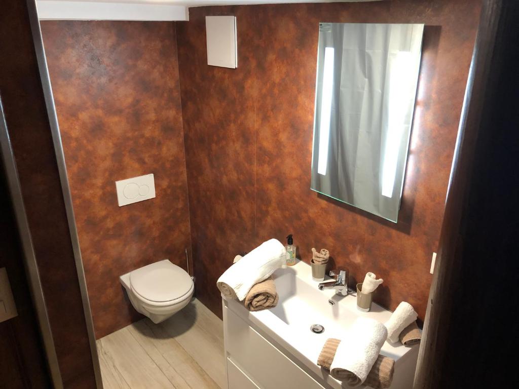 Koupelna v ubytování Appart'Hôtel HG