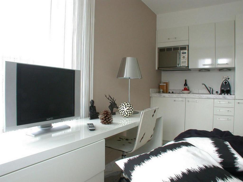 Una cocina o cocineta en VISIONAPARTMENTS Rotachstrasse - contactless check-in