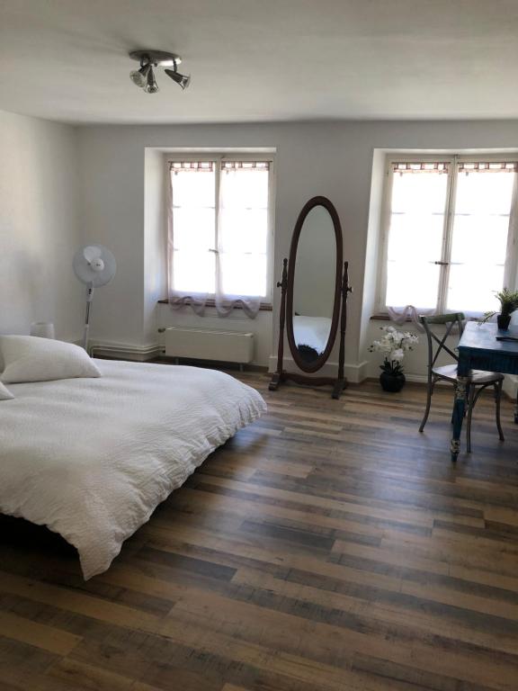 Postel nebo postele na pokoji v ubytování Appart'Hôtel HG
