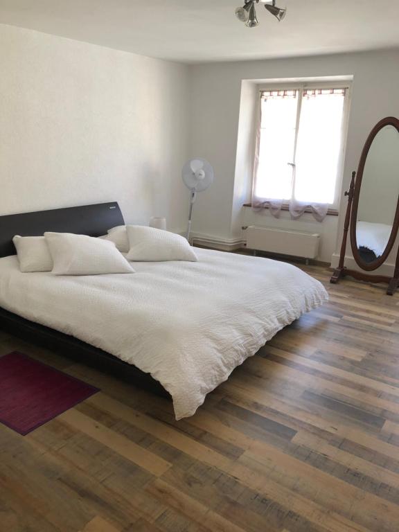 Postel nebo postele na pokoji v ubytování Appart'Hôtel HG