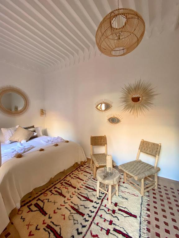 Postel nebo postele na pokoji v ubytování Riad Le Pèlerin