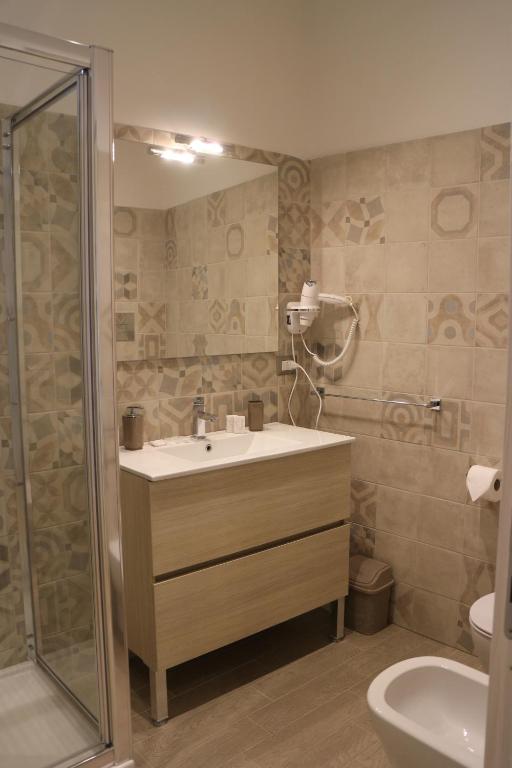 Łazienka w obiekcie Musmelia Rooms
