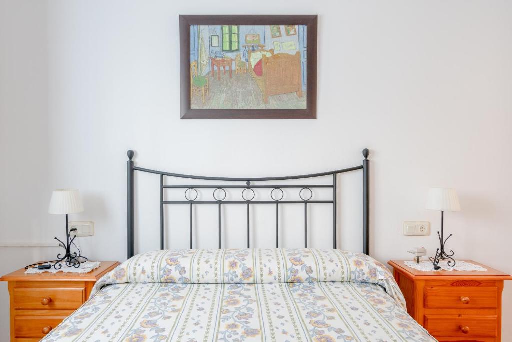 Postel nebo postele na pokoji v ubytování Villa Padial