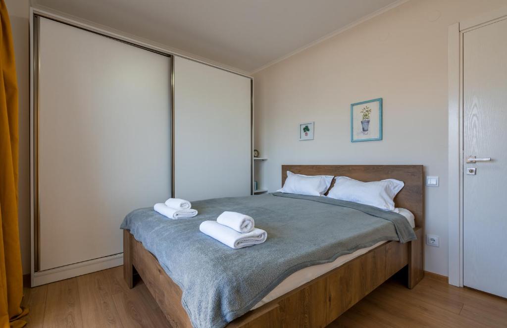 Postel nebo postele na pokoji v ubytování 2-room Apartment NFT Vista Gudauri 17- Near Ski Lift