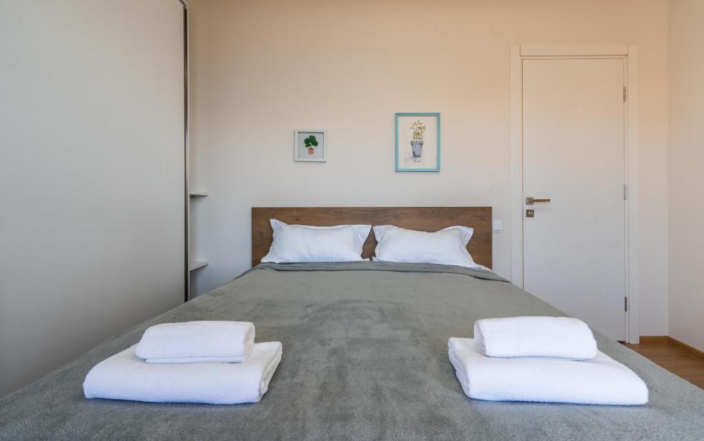 Postel nebo postele na pokoji v ubytování 2-room Apartment NFT Vista Gudauri 17- Near Ski Lift