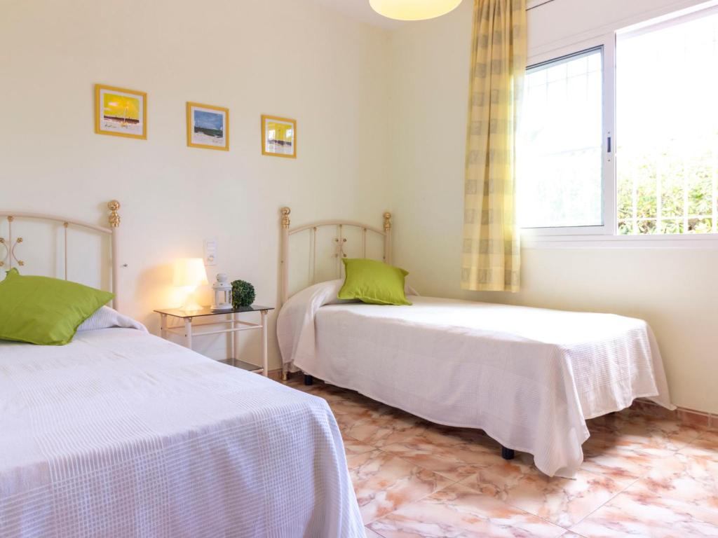 Posteľ alebo postele v izbe v ubytovaní Holiday Home Jardi by Interhome