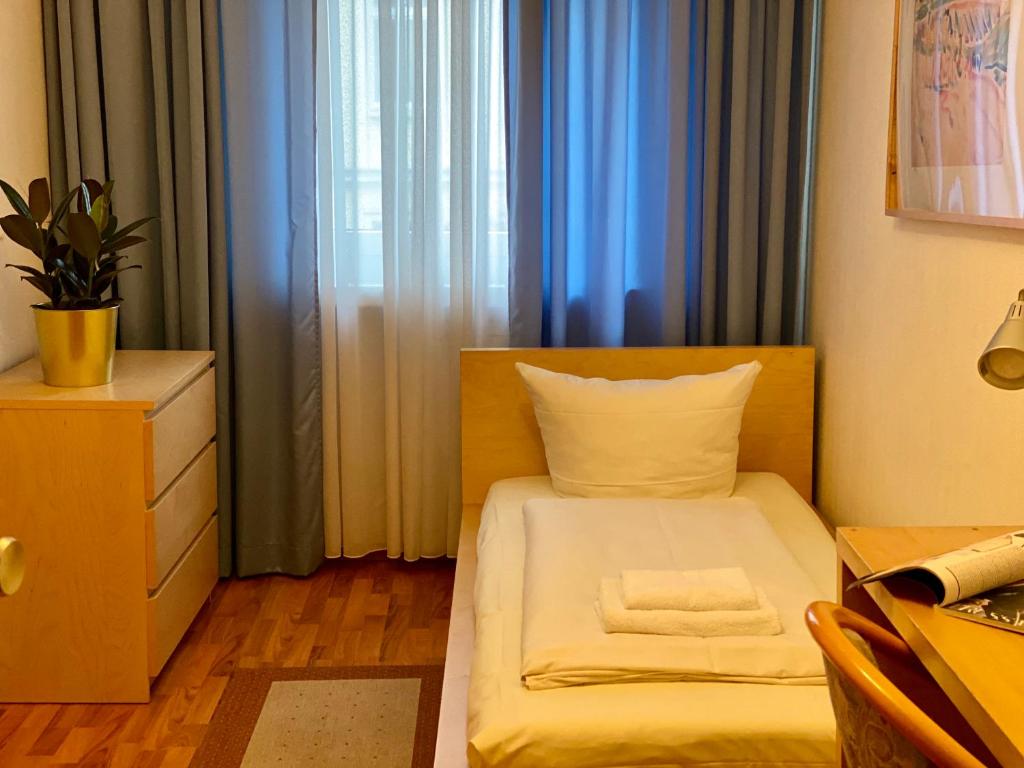 Postel nebo postele na pokoji v ubytování Hotel Arena Rooms - Berlin Mitte