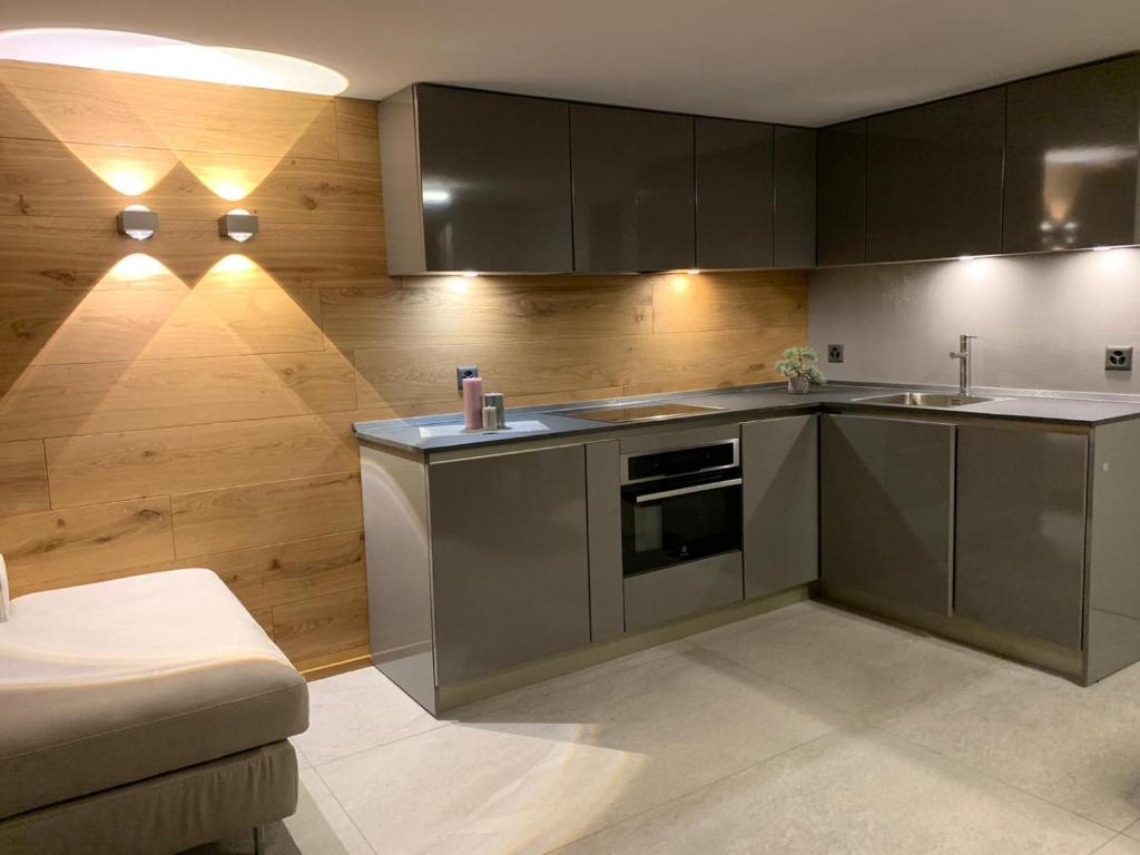 Kuchyň nebo kuchyňský kout v ubytování Kirchplatz Apartment Lupus & Cervus