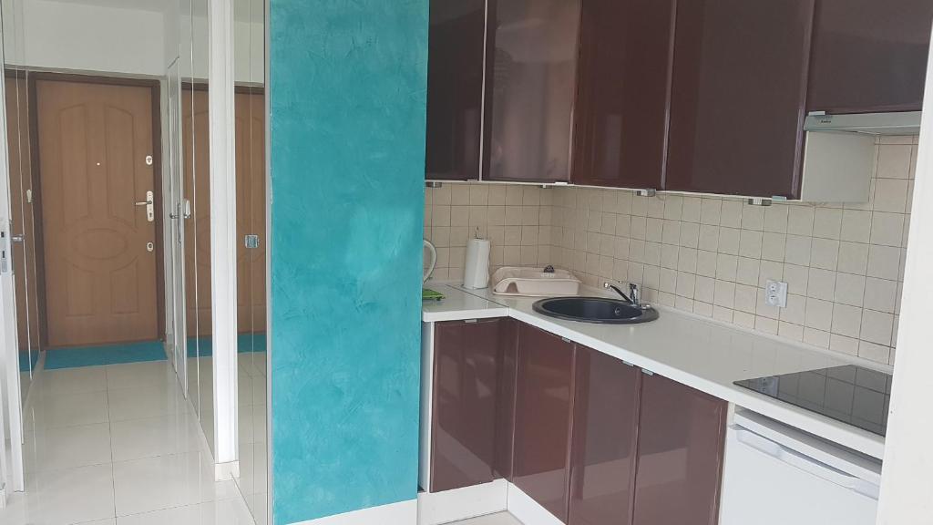 Kuchyňa alebo kuchynka v ubytovaní Centre Apartamenty Warszawa