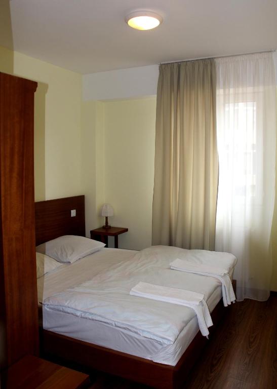Postel nebo postele na pokoji v ubytování Hotel Deka Gudauri