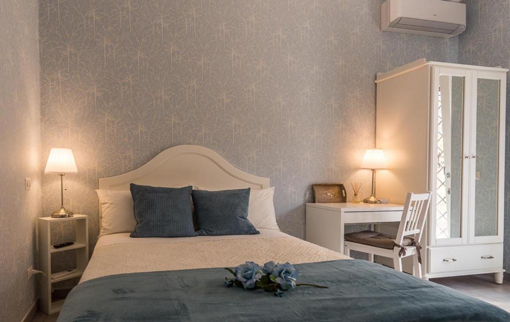 Posteľ alebo postele v izbe v ubytovaní A Casa di Titty