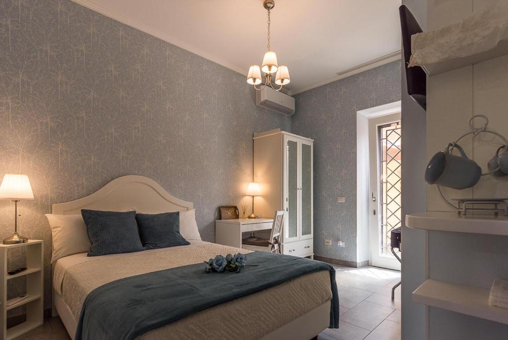 Posteľ alebo postele v izbe v ubytovaní A Casa di Titty
