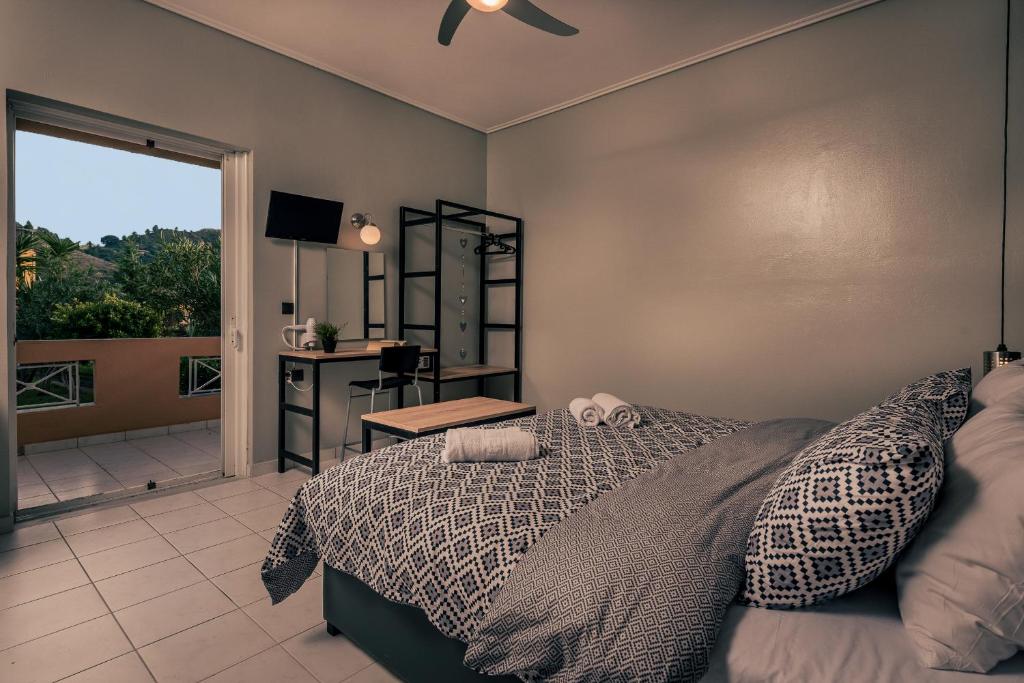 Posteľ alebo postele v izbe v ubytovaní Filoxenia Luxury Studios & Apartments