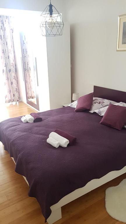Postel nebo postele na pokoji v ubytování Penthouse HEART OF SLAVONIA ****