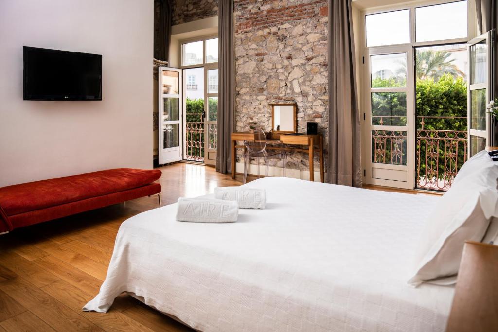 Posteľ alebo postele v izbe v ubytovaní Aire Hotel & Ancient Baths