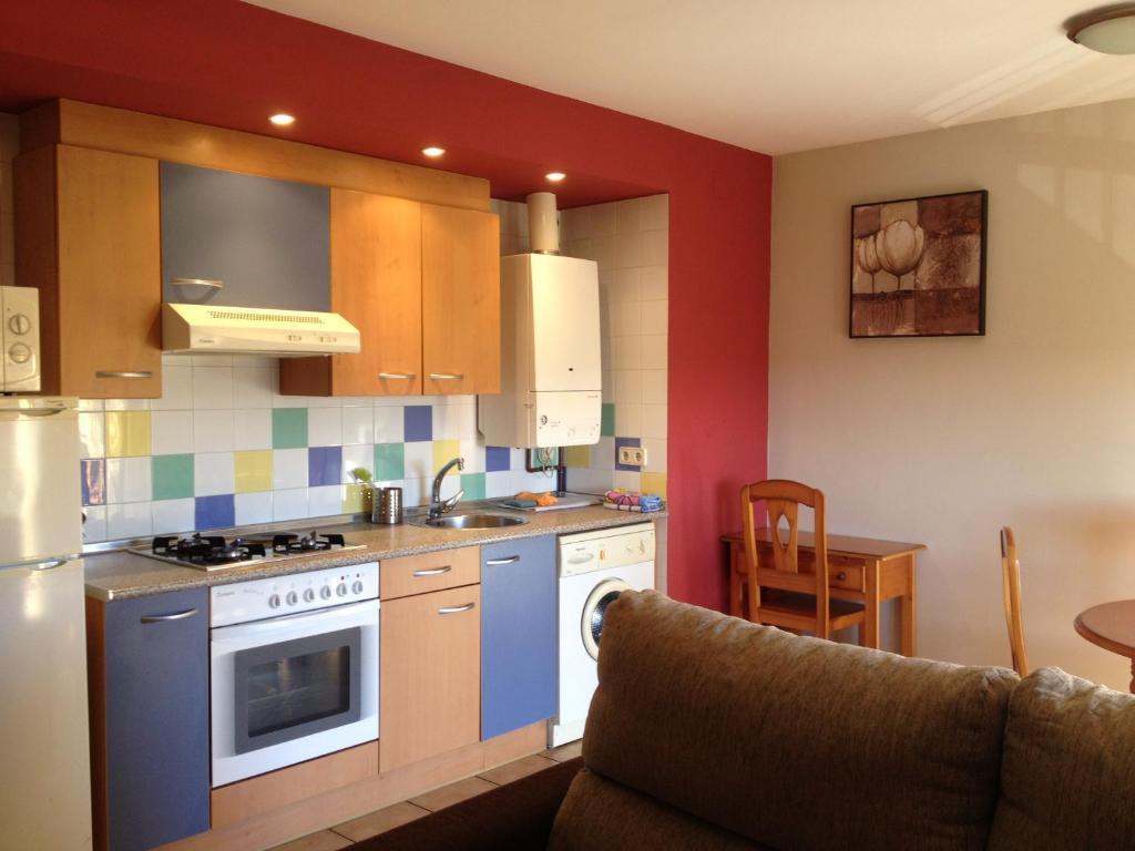 Kuchyň nebo kuchyňský kout v ubytování Apartamentos Residencial Fornocal