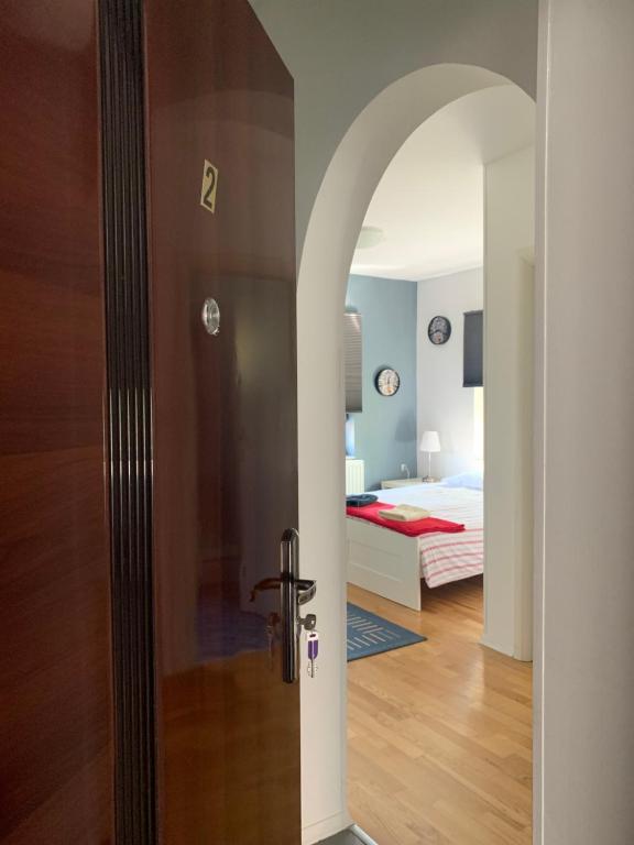 Postel nebo postele na pokoji v ubytování Celic Art Apartments
