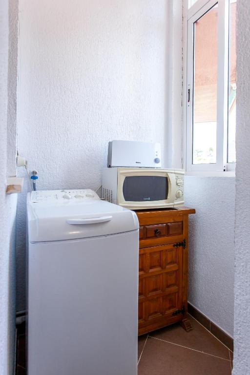 Posteľ alebo postele v izbe v ubytovaní Las Góndolas Apartamento Sunny