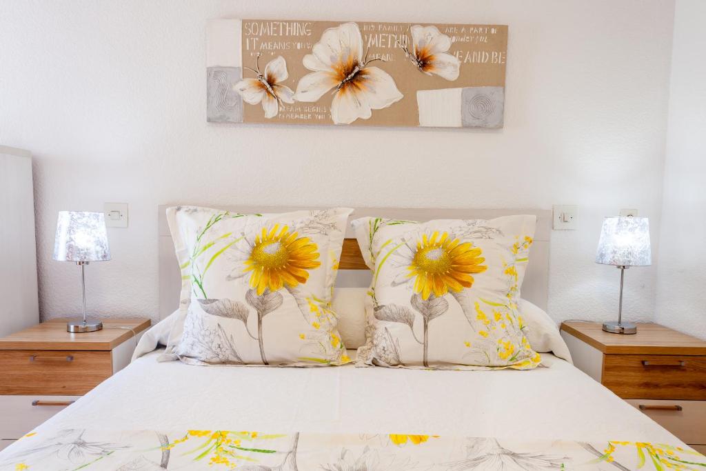 Posteľ alebo postele v izbe v ubytovaní Las Góndolas Apartamento Sunny