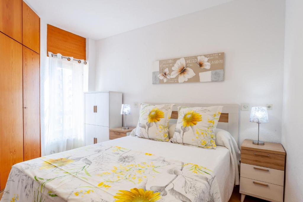 Posteľ alebo postele v izbe v ubytovaní Las Góndolas Apartamento Sunny