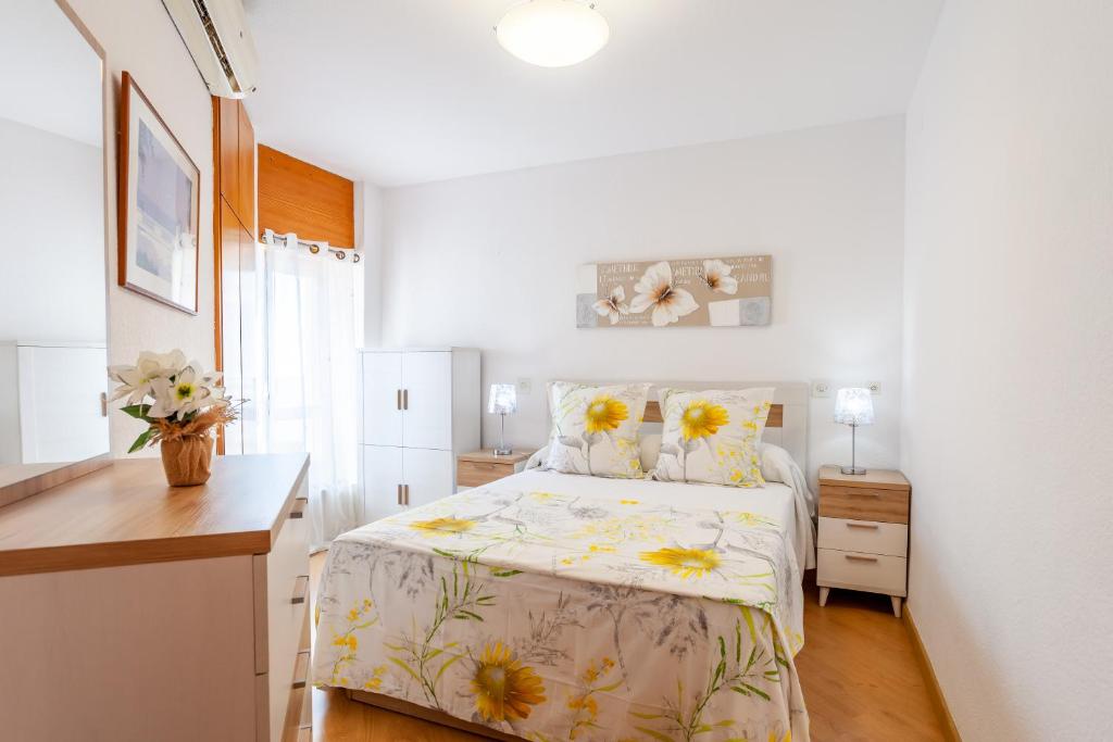 Posteľ alebo postele v izbe v ubytovaní Las Góndolas Apartamento Sunny