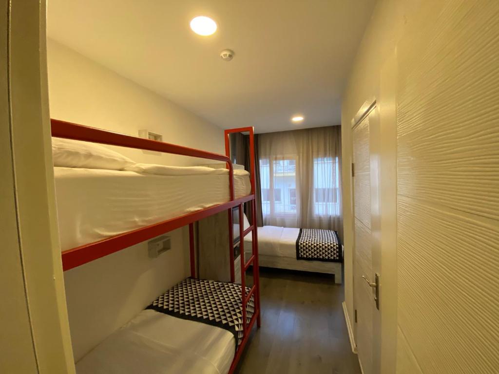 Postel nebo postele na pokoji v ubytování Piano Hotel