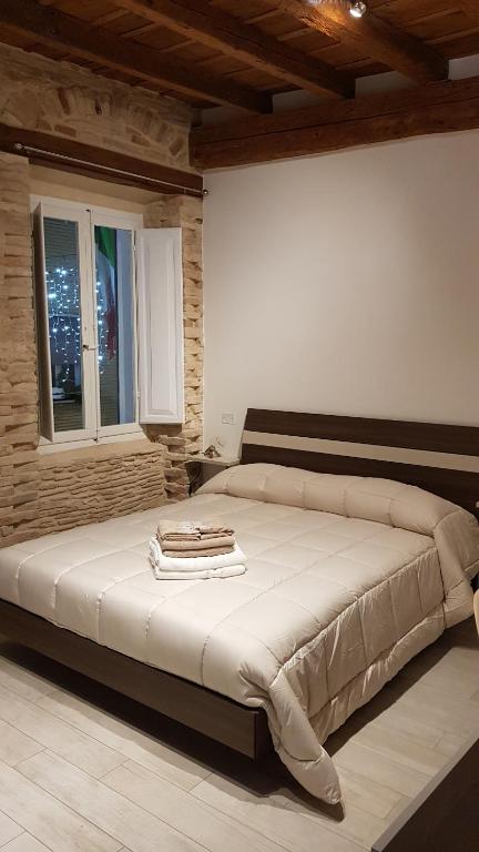 Postel nebo postele na pokoji v ubytování B&B DEL CORSO