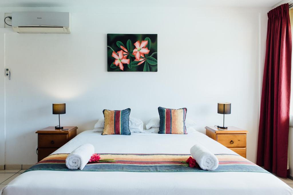 Postel nebo postele na pokoji v ubytování Kaiviti Motel
