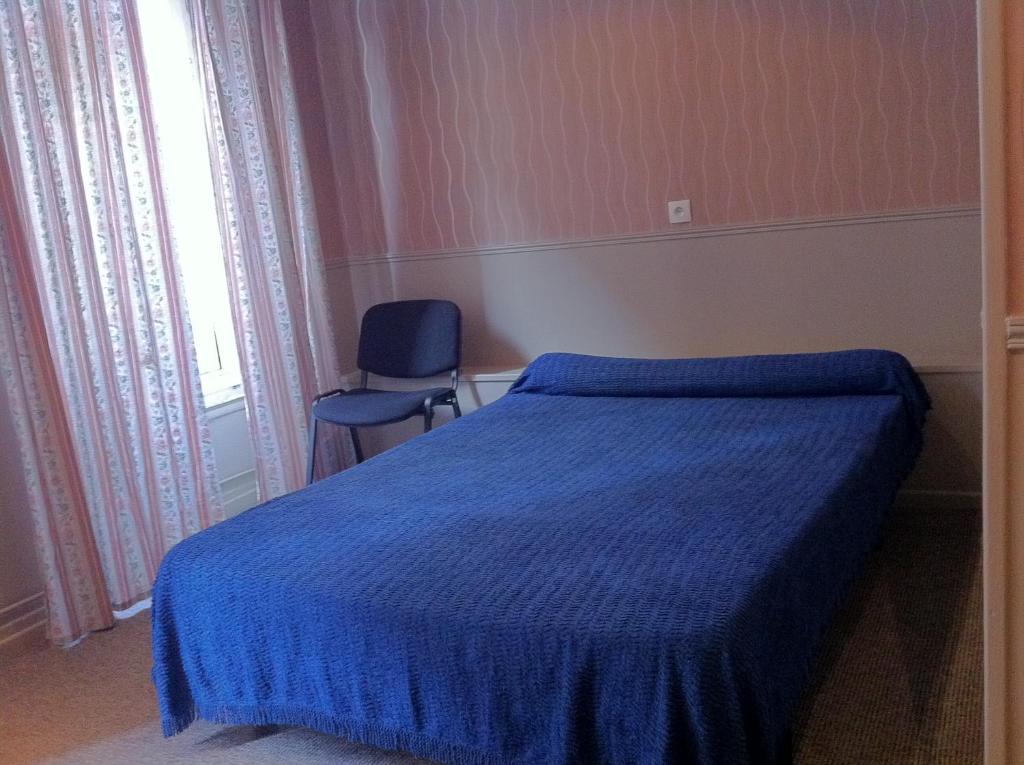 Ένα ή περισσότερα κρεβάτια σε δωμάτιο στο Hotel Des Arts
