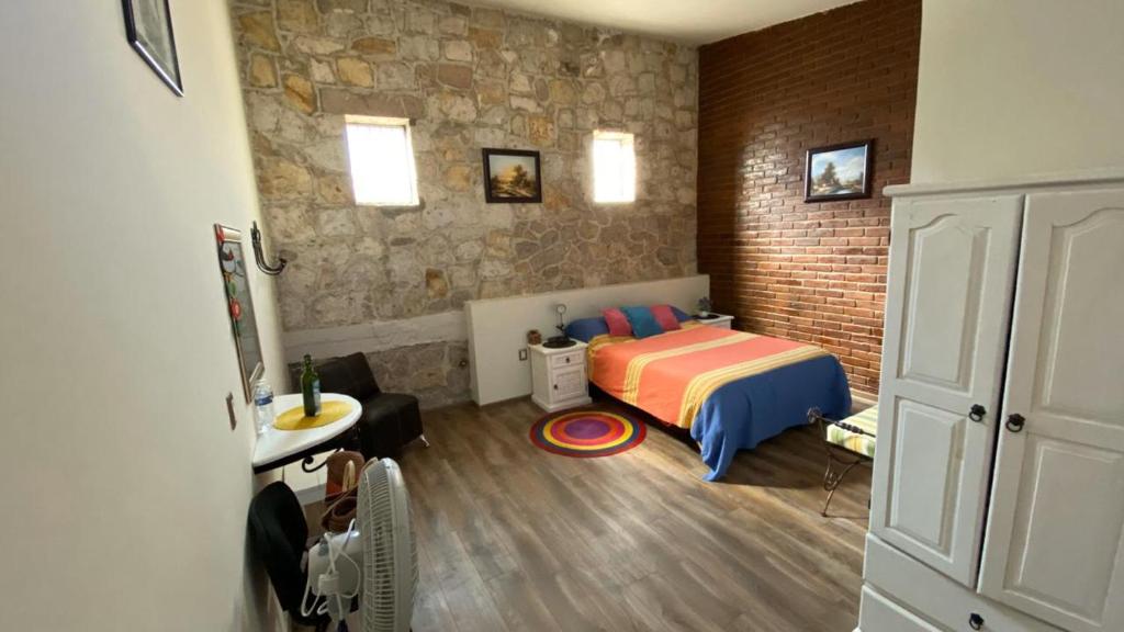 Postel nebo postele na pokoji v ubytování Casa Ana Celia