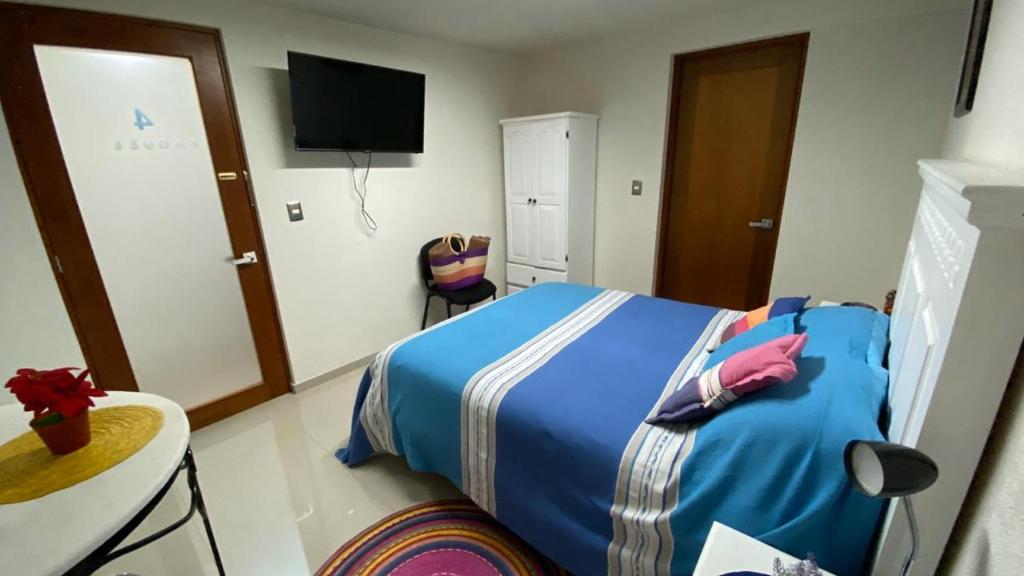 Postel nebo postele na pokoji v ubytování Casa Ana Celia